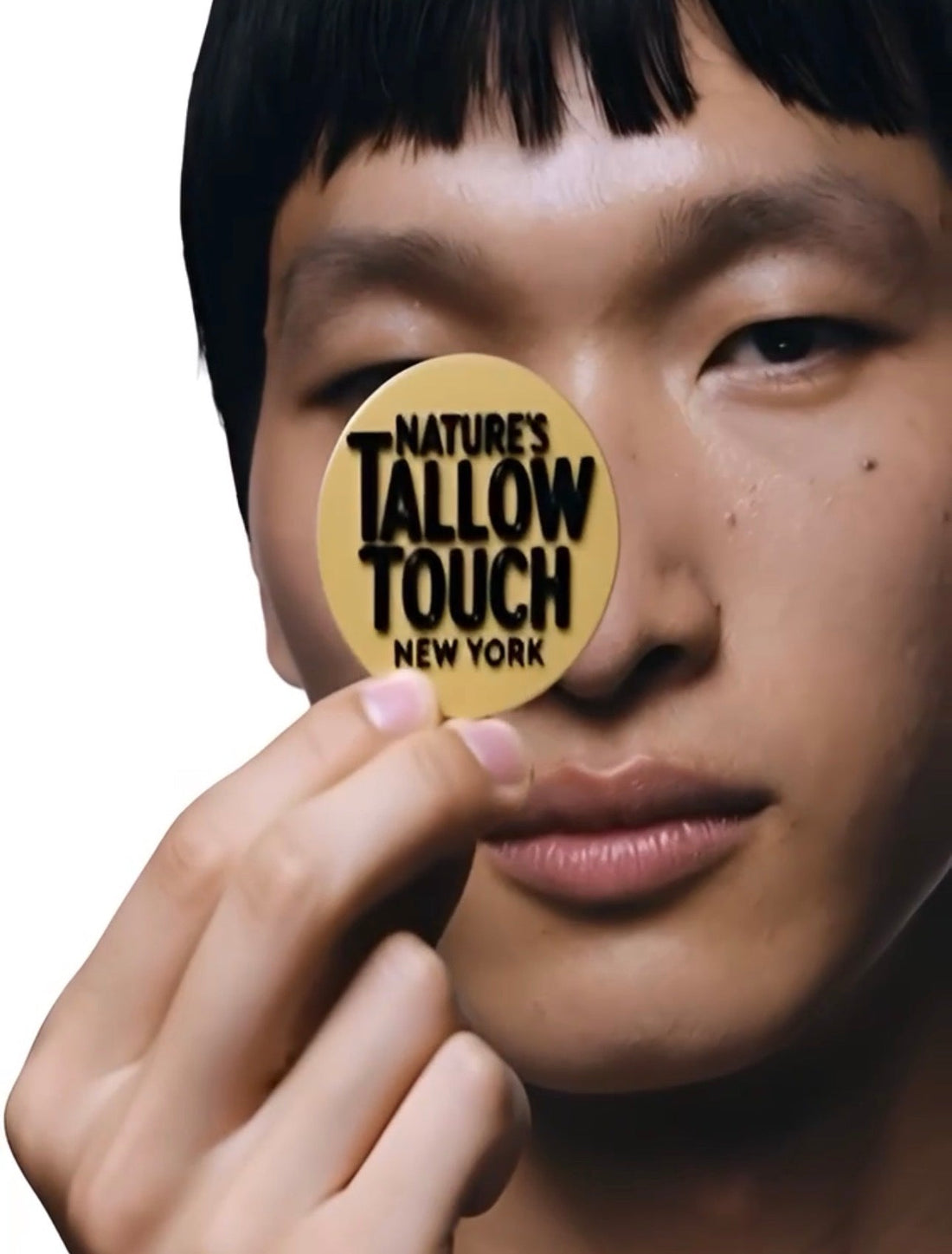 Close-up portrait with dewy, healthy-looking skin beside the Nature’s Tallow Touch badge; headline “Skincare Has No Gender.”